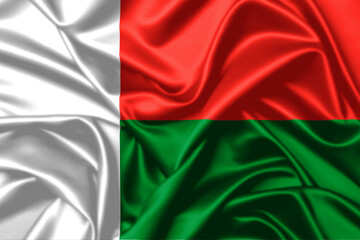 Madagascar waving flag close up satin texture background