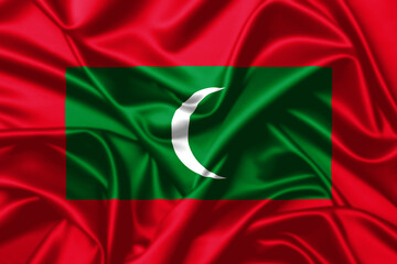 Maldives waving flag close up satin texture background