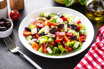 Greek salad. Vegetable salad with tomato, cucumber, feta cheese and olive oil.