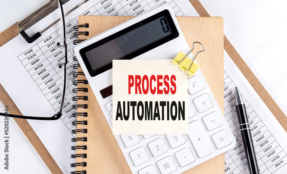 Aufkleber process automation word on sticky with clipboard and notebook, business concept