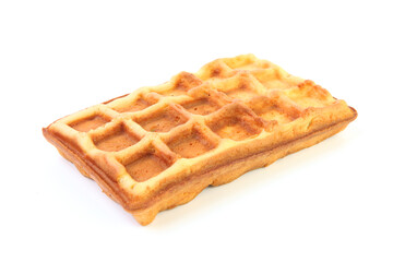 The waffle is corrugated. Ready, sweet, fried in a waffle iron dessert. Delicious breakfast for tea in the morning.