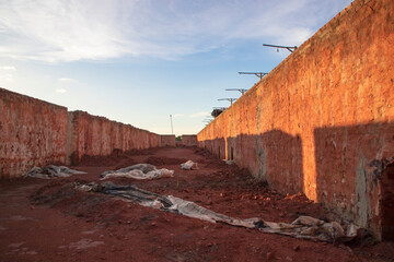 Brickfield View of the Evening Sunlight under the White Cloudy Blue sky