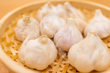 Stack of garlic on basket