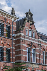 Obraz premium Original, monumental building was once office of Westergasfabriek used to be a factory all those years ago and was constructed in 1885 so as to produce gas. Westerpark, Amsterdam, the Netherlands.