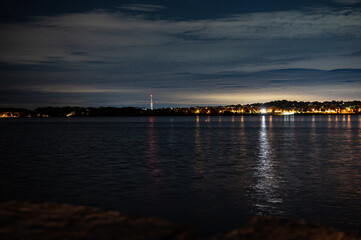 centennial beach barrie at night time building lights boat yard all in view 
