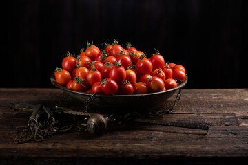 Fototapeta na wymiar Fresh Red tomatoes box on wooden table.