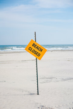 Beach closed sign
