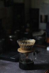 Pouring coffee into a cup