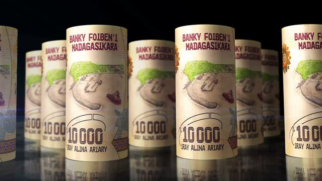 Madagascar money Malagasy Ariary money rolls loop 3d animation. Camera moving in front of the MGA rolling banknotes. Seamless loopable concept of economy, finance, business and debt.