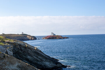 Northern Spain beach, beautiful sea, next to cliffs and rocks on the shore