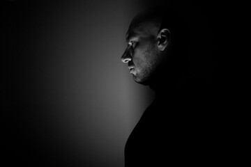 black and white portrait of a sad person