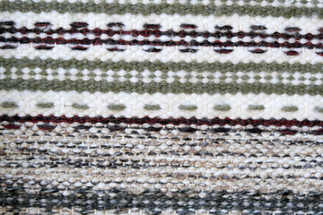 Fototapeta premium Fragments of hand-knitted floor rugs
