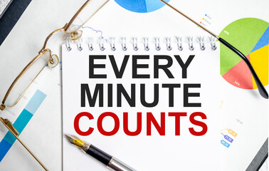 every minute counts word on notepad with glasses and chart - obrazy, fototapety, plakaty