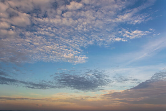 Beautiful sky background with picturesque cirrocumulus clouds during sunset