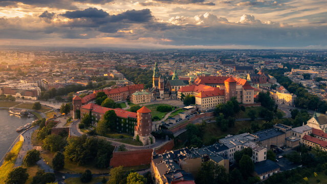 Wawel Royal Castle in Krak&oacute;w, Poland. This aerial, drone photo was taken during the sunset in a beautiful city which is a popular destination to visit in Europe.