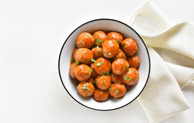 Meatballs with tomato sauce in bowl