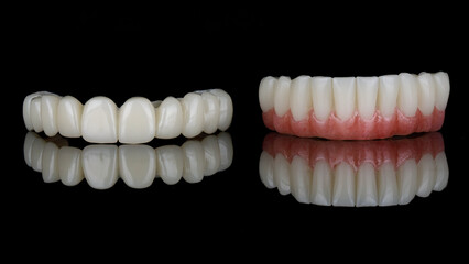 two dental prostheses without beams on black glass with reflection