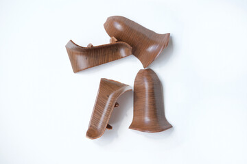 outer skirting board corners for cable cover on white background isolated