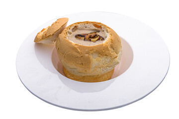 Cashew Mushroom Soup served in Bread Bowl isolated on white background side view