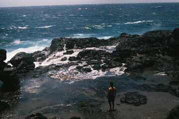 man on the rocky beach