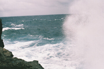 wave crashing on the rocks