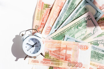 2022 money, economy and investment plan. new year economy crisis and change. money, alarm clock ,finance background.Bankruptcy and debt. Pay for debt. Bank collector service.