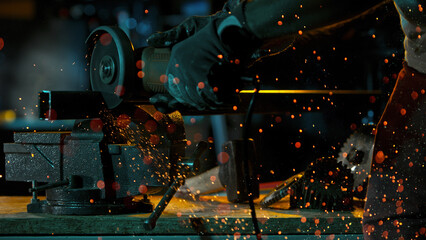 Working Metal Cutter in Workshop. Detail shot, low depth of focus.