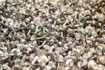 the background is made of self-tapping screws for the installation of the roof.