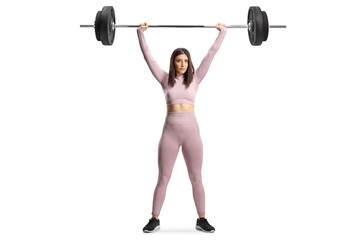 Fototapeta na wymiar Full length portrait of a strong young woman exercising weight lifting