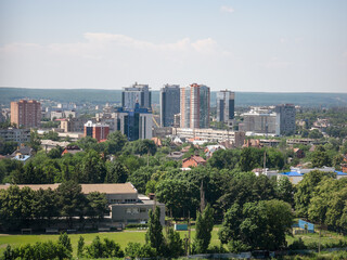 Fototapeta premium Cityscape of a part of the city with a stadium, on a sunny summer day. Ukraine, Kharkiv