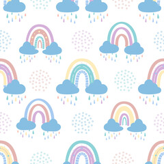 .Abstract rainbow with clouds and raindrops, doodles and circles in a seamless pattern