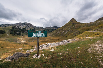 Sign with the inscription Durmitor, National Park Durmitor, Montenegro.
