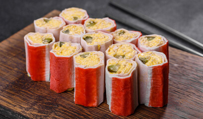 Crab sticks stuffed with rice, egg and green onions