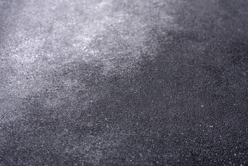 Texture of a concrete wall with cracks and scratches which can be used as a background