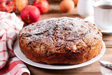 Apple pie, sponge cake, Charlotte with apples on a table