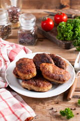 Pork cutlets from minced meat. Pan-fried meatballs. Healthy dinner for the family.
