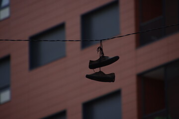 Hanging shoes on a wire