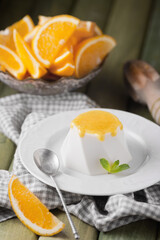 Orange souffle on a white plate, food photography.
