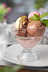 Chocolate ice cream in a glass, food photography.