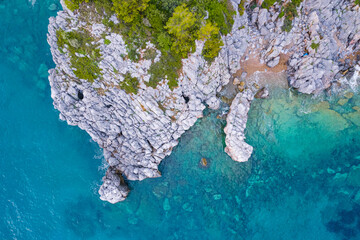 Stunning aerial drone view of Kassandra Cliffs near Paliouri. Untouched natural landscape. Turquoise water. High quality photo