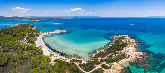 Panoramic aerial drone shot of the beautiful Karydi Beach. Natural sea water in various colors. High quality photo