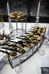 Rows of appetizers and starters on the wedding table