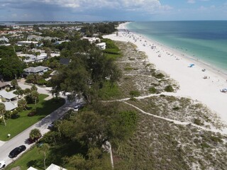 Cortez beach and the sugar white sands attract visitors from all over during the wintertime 