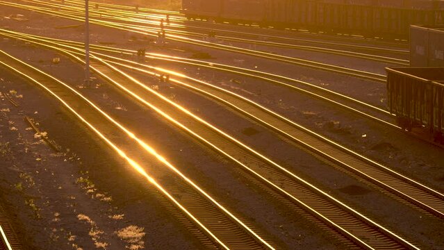 Railway freight transport marshalling yard at sunset