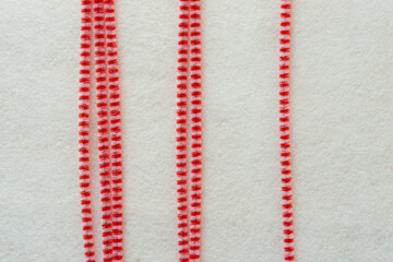 decorative background with pipe cleaners and white felt