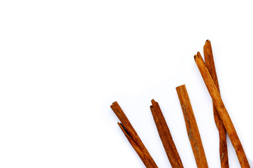Cinnamon sticks on white background.