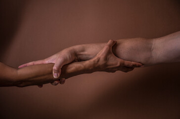 close up of hands holding hands. Body. Sensual. Hands concept. Background. Family. 