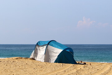 Tent for rest on the shores of the Mediterranean Sea.