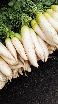 bunch of white radish in traditional market