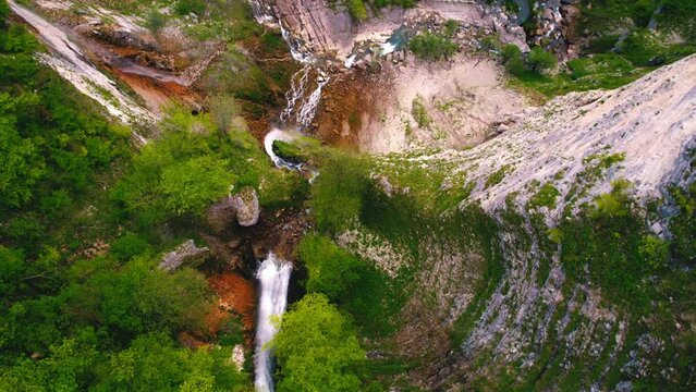 ascending shot of a huge beautiful waterfall and river. High quality 4k footage